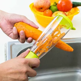 Handschäler mit Behälter