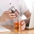 Teetasse, Teeflasche mit Sieb