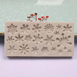   Weihnachtliche Schneeflocken-Silikonform für Schokolade und Muffins