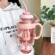 Große 1200-ml-Sportwasserflasche aus Kunststoff mit Griff und Trinkhalm