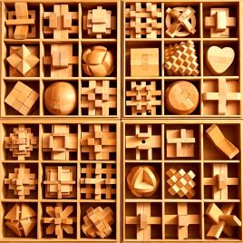 Neun-Glieder-Holz-Lernspiel im Geschenkkarton