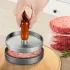 Grauer Metall-Burgerpresse