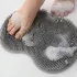 Ein Wandmontierter Duschfuß- und Rückenmassierer mit Massagekissen und Saugnäpfen - Entfernt abgestorbene Haut