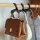 Taschenorganizer Haken