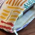 Kleine Bunte Gestreifte Schminktasche