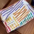 Kleine Bunte Gestreifte Schminktasche